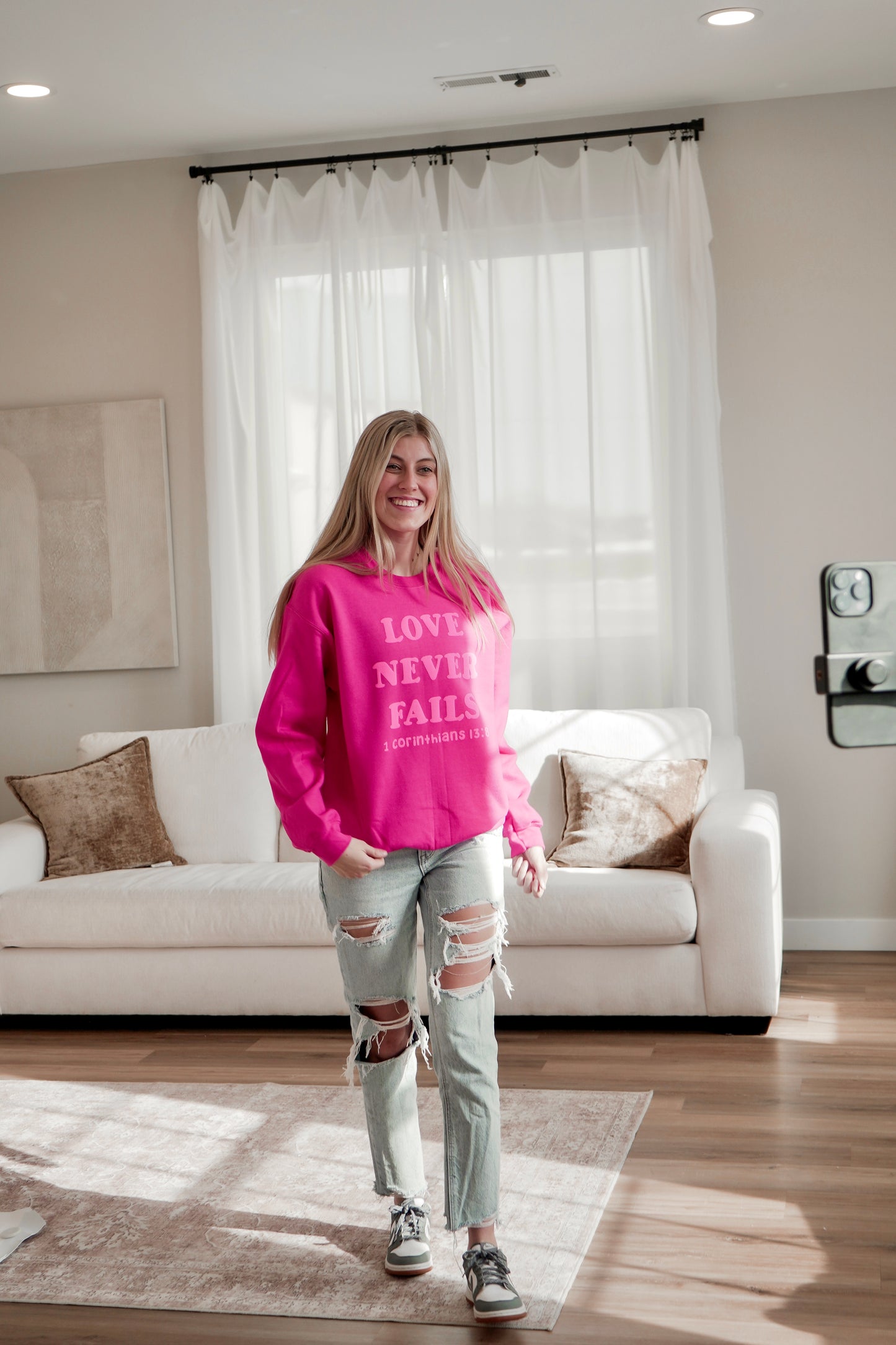 Love Never Fails Crewneck