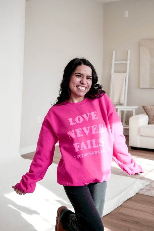 Love Never Fails Crewneck