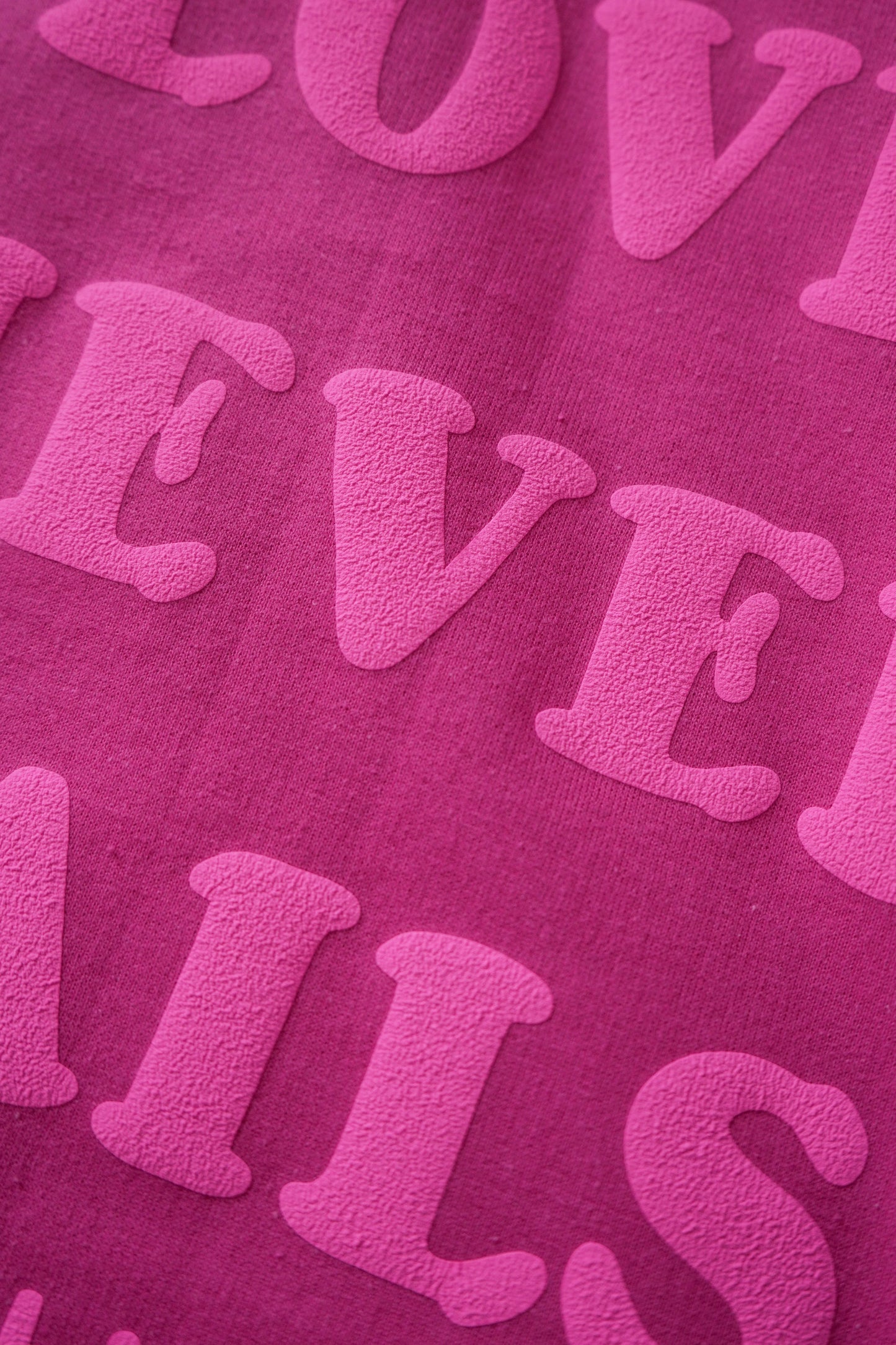 Love Never Fails Crewneck